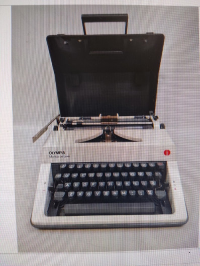 Olympia Schreibmaschine De Luxe Portable mit origi